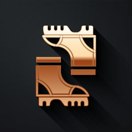 Gold Waterproof rubber boot icon isolated on black background. Gumboots for rainy weather, fishing, gardening. Long shadow style. Vectorのイラスト素材