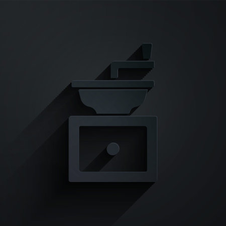Paper cut Manual coffee grinder icon isolated on black background. Paper art style. Vectorのイラスト素材