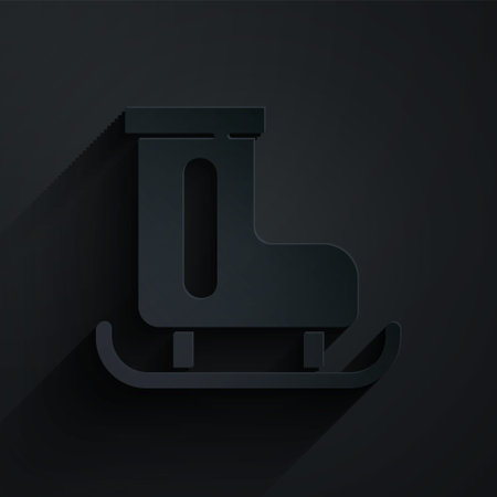 Paper cut Figure skates icon isolated on black background. Ice skate shoes icon. Sport boots with blades. Paper art style. Vectorのイラスト素材