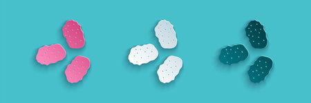 Paper cut Chicken nuggets icon isolated on blue background. Paper art style. Vector Illustration