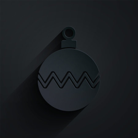 Paper cut Christmas ball icon isolated on black background. Merry Christmas and Happy New Year. Paper art style. Vectorのイラスト素材