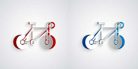 Paper cut Bicycle icon isolated on grey background. Bike race. Extreme sport. Sport equipment. Paper art style. Vectorのイラスト素材