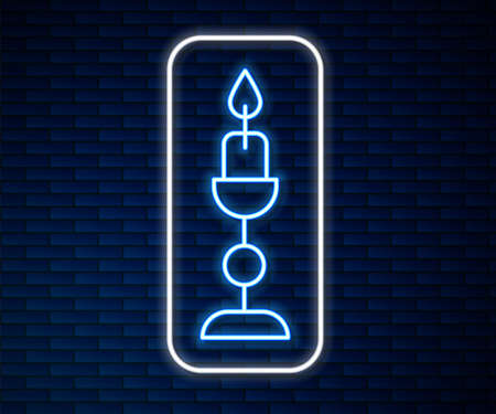 Glowing neon line Burning candle in candlestick icon isolated on brick wall background. Old fashioned lit candle. Cylindrical candle stick with burning flame. Vectorのイラスト素材