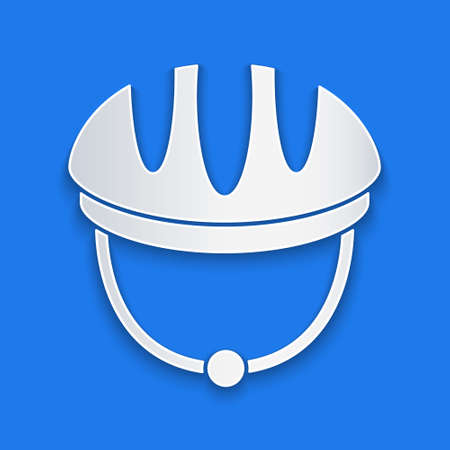 Paper cut Bicycle helmet icon isolated on blue background. Extreme sport. Sport equipment. Paper art style. Vectorのイラスト素材