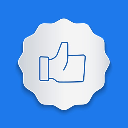 Paper cut Hand thumb up icon isolated on blue background. Paper art style. Vectorのイラスト素材