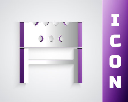 Paper cut BBQ brazier icon isolated on black on purple background. Paper art style. Vectorのイラスト素材
