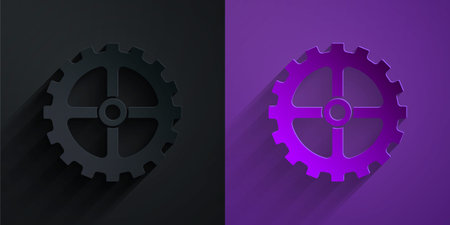 Paper cut Bicycle sprocket crank icon isolated on black on purple background. Paper art style. Vectorのイラスト素材
