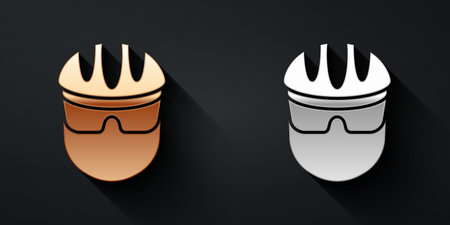 Gold and silver Bicycle helmet icon isolated on black background. Extreme sport. Sport equipment....