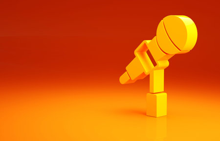 Yellow Microphone icon isolated on orange background. On air radio mic microphone. Speaker sign....