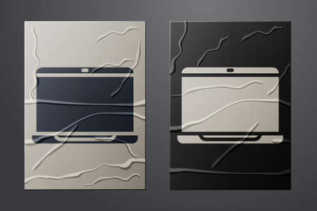 White Laptop icon isolated on crumpled paper background. Computer notebook with empty screen sign. Paper art style. Vector Illustrationのイラスト素材