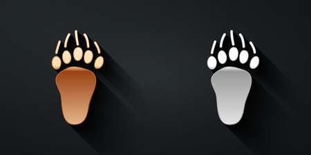 Gold and silver Bear paw footprint icon isolated on black background. Long shadow style. Vectorのイラスト素材
