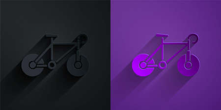 Paper cut Bicycle icon isolated on black on purple background. Bike race. Extreme sport. Sport equipment. Paper art style. Vectorのイラスト素材