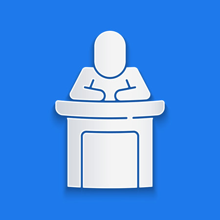 Paper cut Speaker icon isolated on blue background. Orator speaking from tribune. Public speech. Person on podium. Paper art style. Vectorのイラスト素材