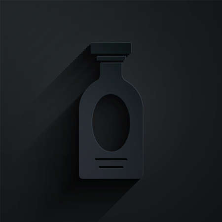 Paper cut Alcohol drink Rum bottle icon isolated on black background. Paper art style. Vectorのイラスト素材