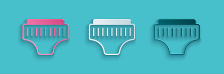 Paper cut Adult diaper icon isolated on blue background. Paper art style. Vector