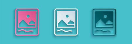 Paper cut Photo frame icon isolated on blue background. Vintage empty photos frame. Paper art style. Vectorのイラスト素材
