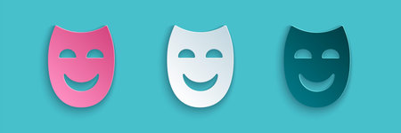 Paper cut Comedy theatrical mask icon isolated on blue background. Paper art style. Vectorのイラスト素材