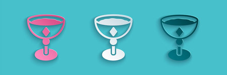 Paper cut Medieval goblet icon isolated on blue background. Paper art style. Vector