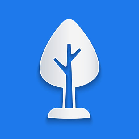 Paper cut Tree icon isolated on blue background. Forest symbol. Paper art style. Vectorのイラスト素材