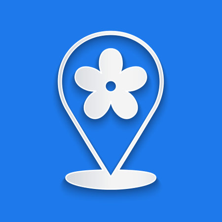 Paper cut Location with flower icon isolated on blue background. Paper art style. Vectorのイラスト素材