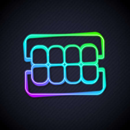 Glowing neon line False jaw icon isolated on black background. Dental jaw or dentures, false teeth with incisors. Vectorのイラスト素材