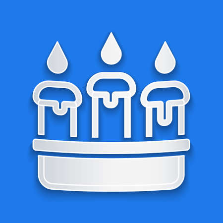 Paper cut Burning candle in candlestick icon isolated on blue background. Cylindrical candle stick with burning flame. Paper art style. Vectorのイラスト素材