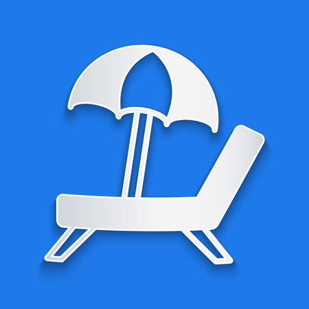 Paper cut Sunbed icon isolated on blue background. Beach umbrella and Sun lounger. Paper art style. Vectorのイラスト素材