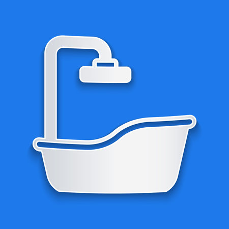 Paper cut Bathtub icon isolated on blue background. Paper art style. Vectorのイラスト素材