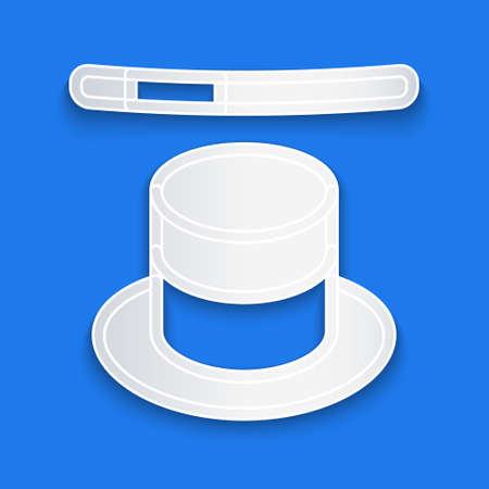 Paper cut Magic hat and wand icon isolated on blue background. Magic trick. Mystery entertainment concept. Paper art style. Vectorのイラスト素材