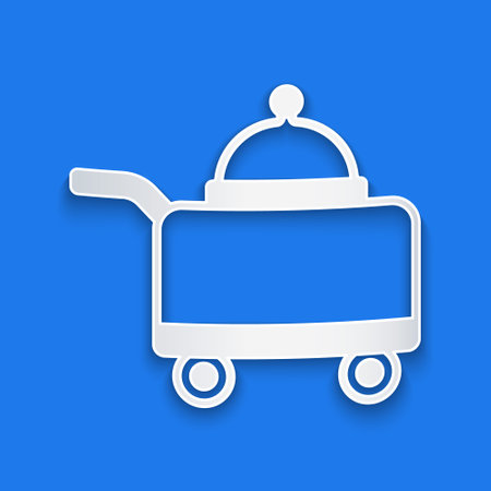 Paper cut Covered with a tray of food icon isolated on blue background. Tray and lid sign. Restaurant cloche with lid. Paper art style. Vectorのイラスト素材