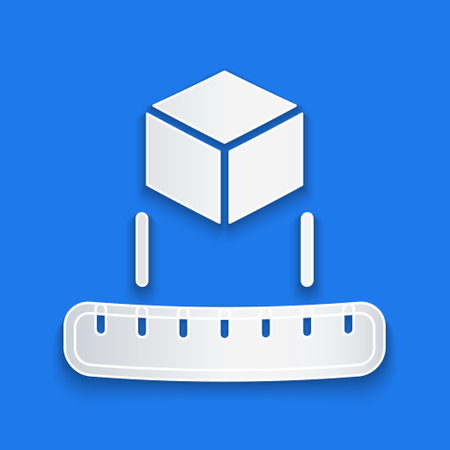 Paper cut Isometric cube icon isolated on blue background. Geometric cubes solid icon. 3D square sign. Box symbol. Paper art style. Vectorのイラスト素材