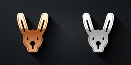 Gold and silver Rabbit with ears icon isolated on black background. Magic trick. Mystery entertainment concept. Long shadow style. Vectorのイラスト素材