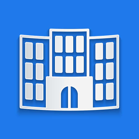 Paper cut Hotel building icon isolated on blue background. Paper art style. Vectorのイラスト素材