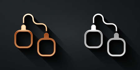 Gold and silver Handcuffs icon isolated on black background. Long shadow style. Vectorのイラスト素材
