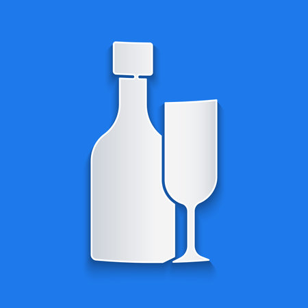 Paper cut Wine bottle with glass icon isolated on blue background. Paper art style. Vectorのイラスト素材
