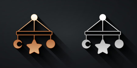 Gold and silver Baby crib hanging toys icon isolated on black background. Baby bed carousel. Long shadow style. Vectorのイラスト素材