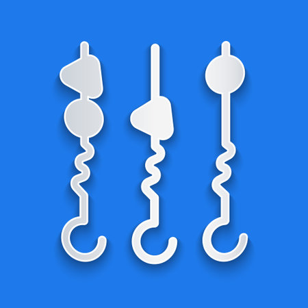 Paper cut Grilled shish kebab on skewer stick icon isolated on blue background. Meat kebab on skewer stick. Picnic with grilled meat. Paper art style. Vectorのイラスト素材