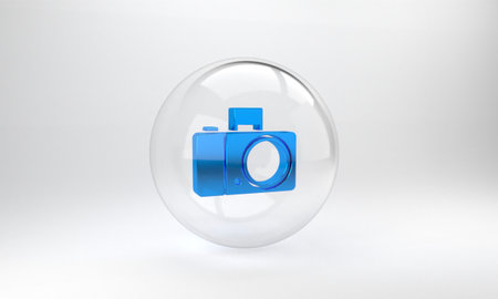Blue Photo camera icon isolated on grey background. Foto camera icon. Glass circle button. 3D render illustrationの写真素材