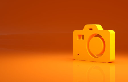 Yellow Photo camera icon isolated on orange background. Foto camera. Digital photography. Minimalism concept. 3d illustration 3D renderの写真素材