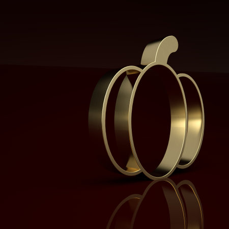 Gold Pumpkin icon isolated on brown background. Happy Halloween party. Minimalism concept. 3D render illustrationの写真素材