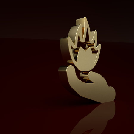 Gold Hand holding a fire icon isolated on brown background. Minimalism concept. 3D render illustrationの写真素材