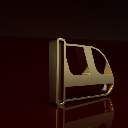 Gold Train and railway icon isolated on brown background. Public transportation symbol. Subway train transport. Metro underground. Minimalism concept. 3D render illustrationの写真素材