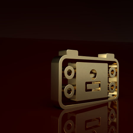 Gold Portable video game console icon isolated on brown background. Handheld console gaming. Minimalism concept. 3D render illustrationの写真素材