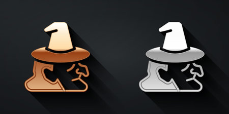 Gold and silver Witch icon isolated on black background. Happy Halloween party. Long shadow style. Vectorのイラスト素材
