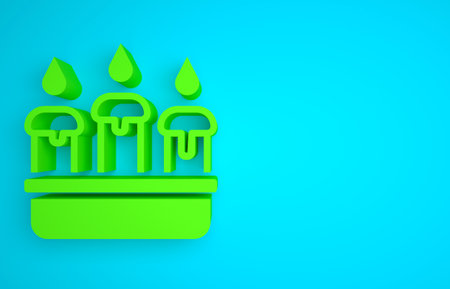 Green Burning candle in candlestick icon isolated on blue background. Cylindrical candle stick with burning flame. Minimalism concept. 3D render illustrationの写真素材