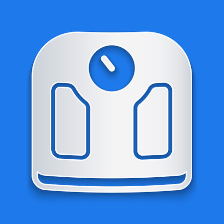 Paper cut Bathroom scales icon isolated on blue background. Weight measure Equipment. Weight Scale fitness sport concept. Paper art style. Vectorのイラスト素材