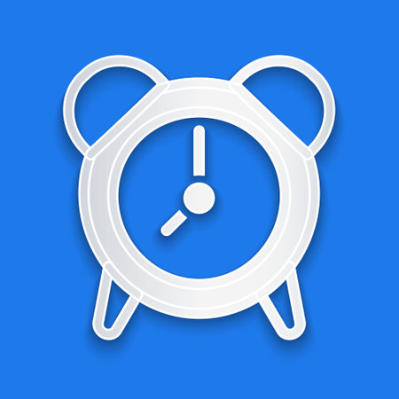 Paper cut Alarm clock icon isolated on blue background. Wake up, get up concept. Time sign. Paper art style. Vectorのイラスト素材
