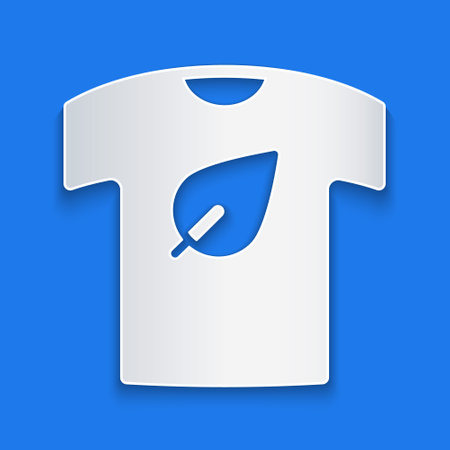 Paper cut Vegan shirt icon isolated on blue background. Paper art style. Vectorのイラスト素材