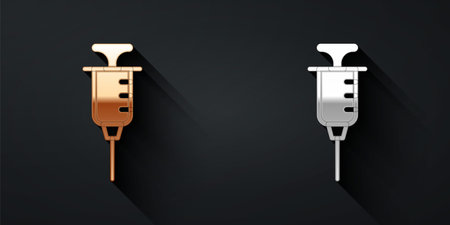 Gold and silver Syringe icon isolated on black background. Syringe for vaccine, vaccination, injection, flu shot. Medical equipment. Long shadow style. Vectorのイラスト素材