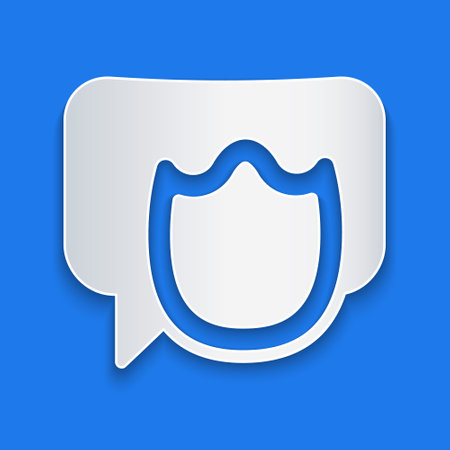 Paper cut Speech bubble chat icon isolated on blue background. Message icon. Communication or comment chat symbol. Paper art style. Vectorのイラスト素材